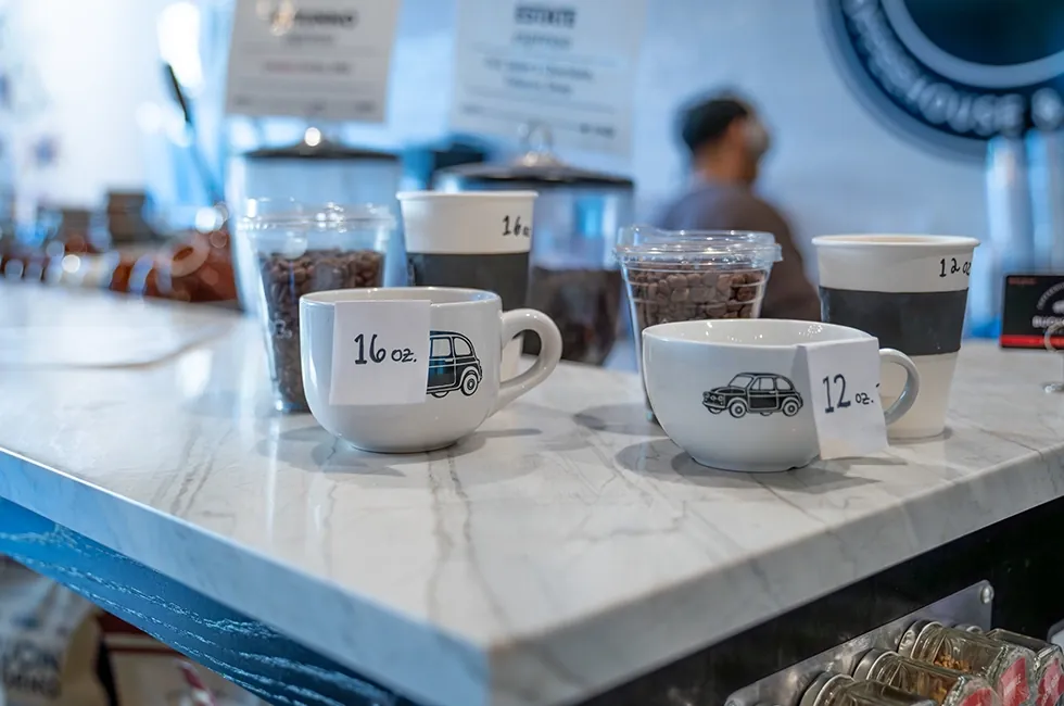 photo of coffee mugs in a coffee shop in ft. worth